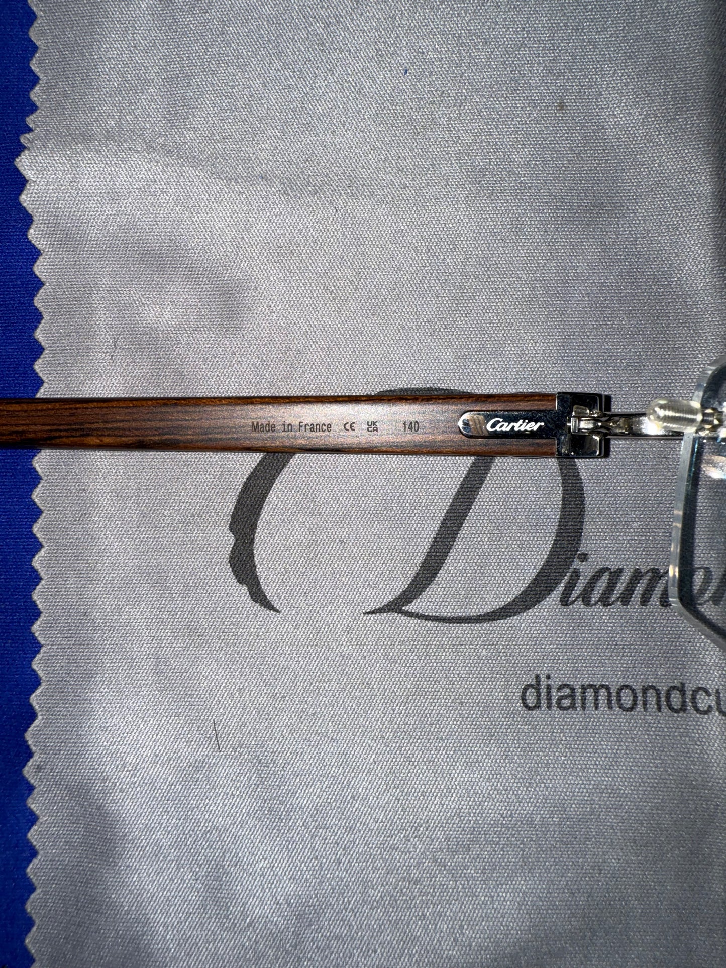 Cartier Silver C’s With Brown Wood Preowned