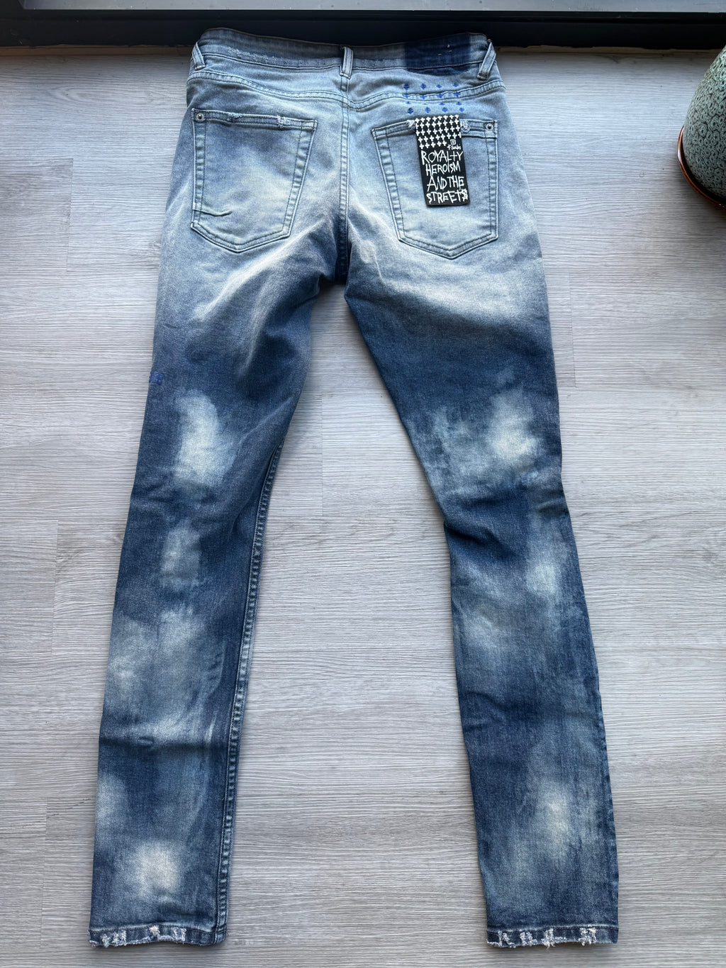 Ksubi ripped blue jeans