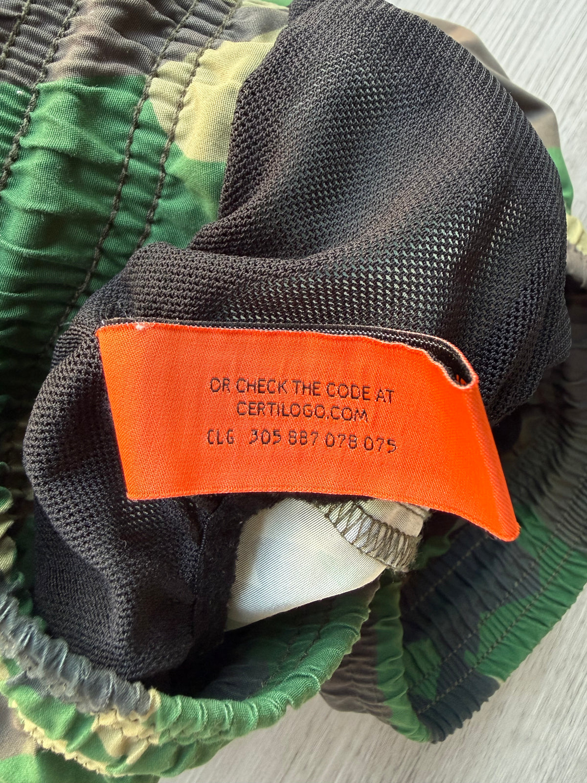 Heron Preston nylon swimshorts military green’