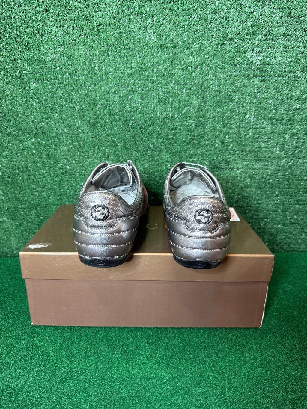 Gucci metallic silver leather low-top sneakers