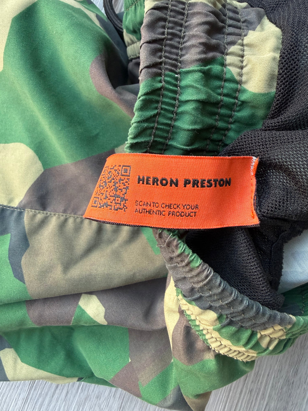 Heron Preston nylon swimshorts military green’
