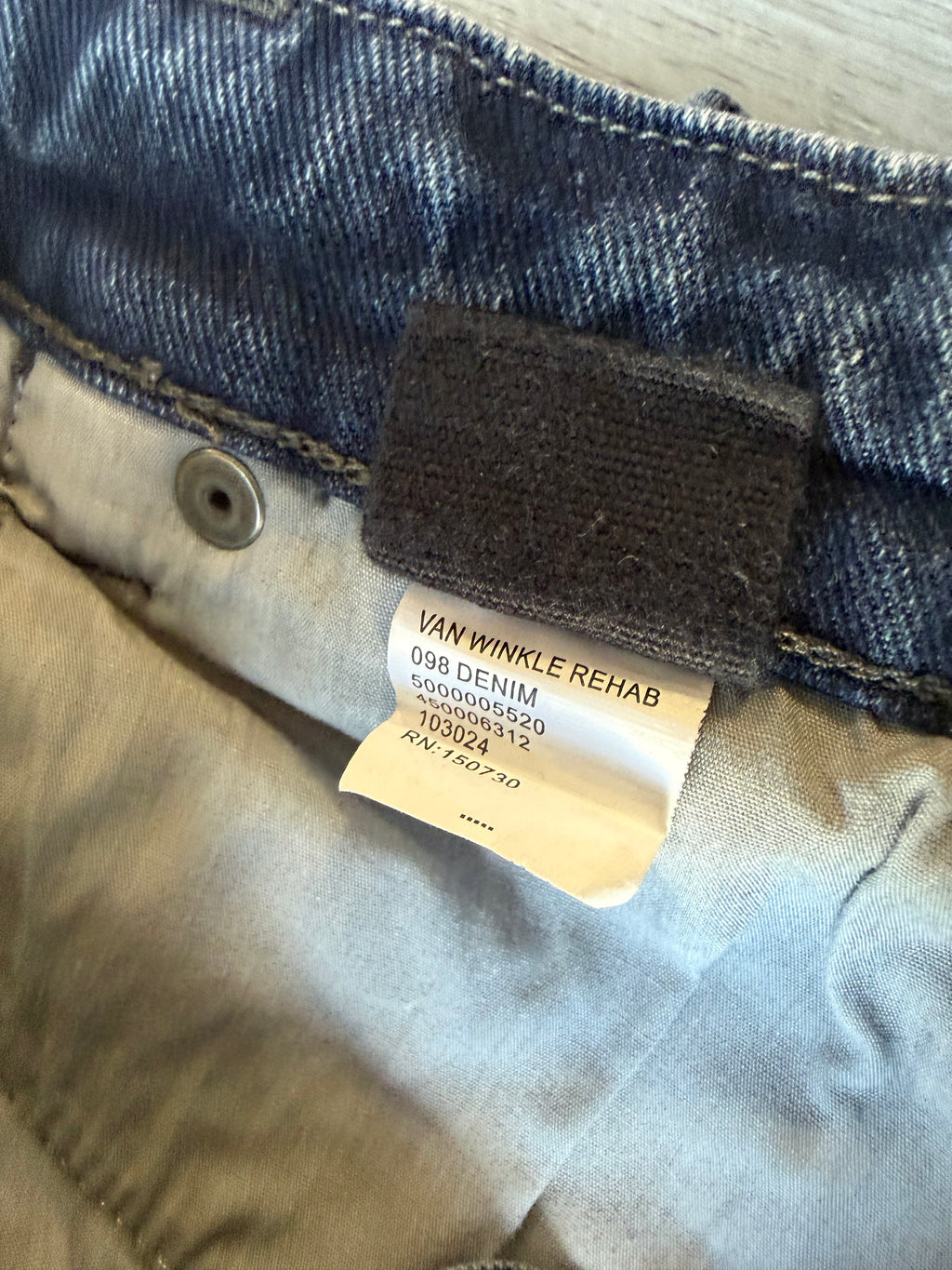 Ksubi ripped blue jeans
