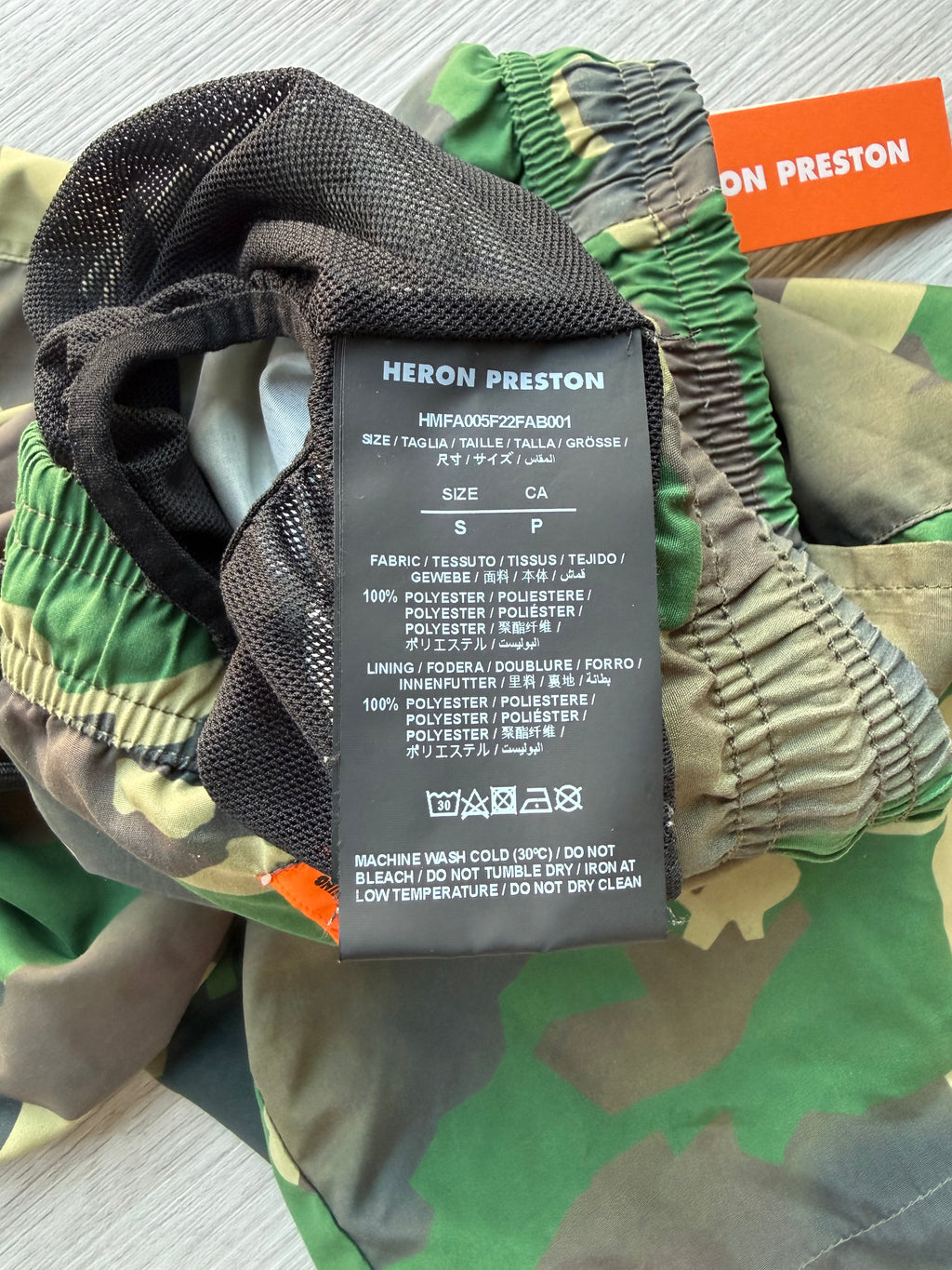 Heron Preston nylon swimshorts military green’