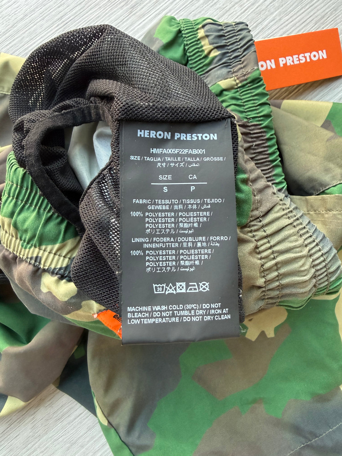 Heron Preston nylon swimshorts military green’
