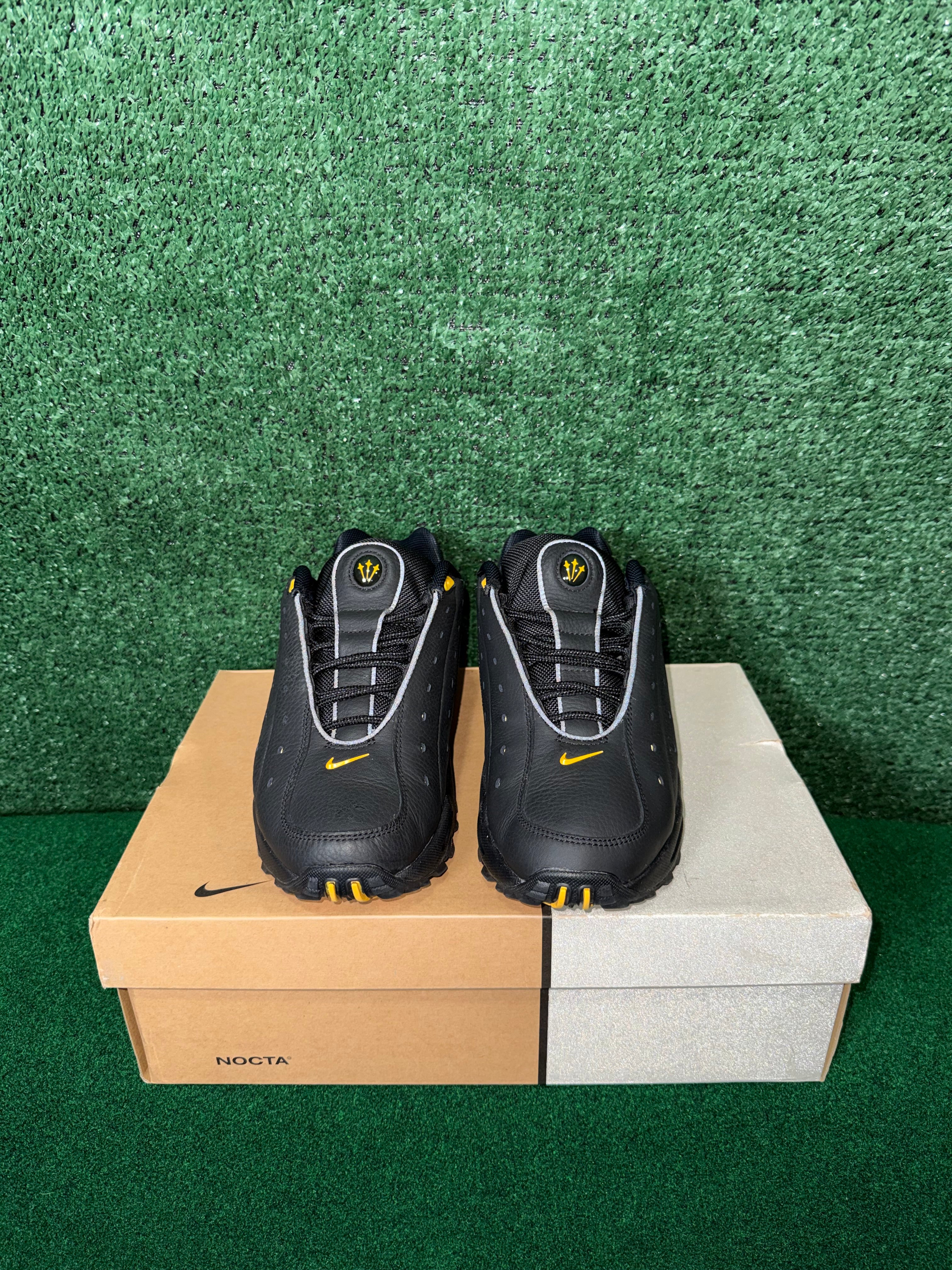 NOCTA X NIKE HOT STEP AIR TERRA ‘BLACK UNIVERSITY GOLD’