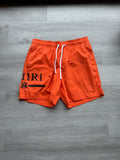 Amiri orange & black ma bar logo swimshorts