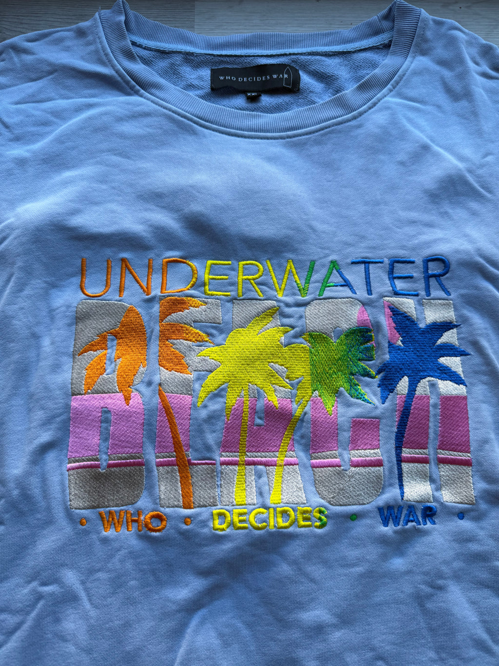 Who decides war “underwater beach” embroidered crewneck sweatshirt