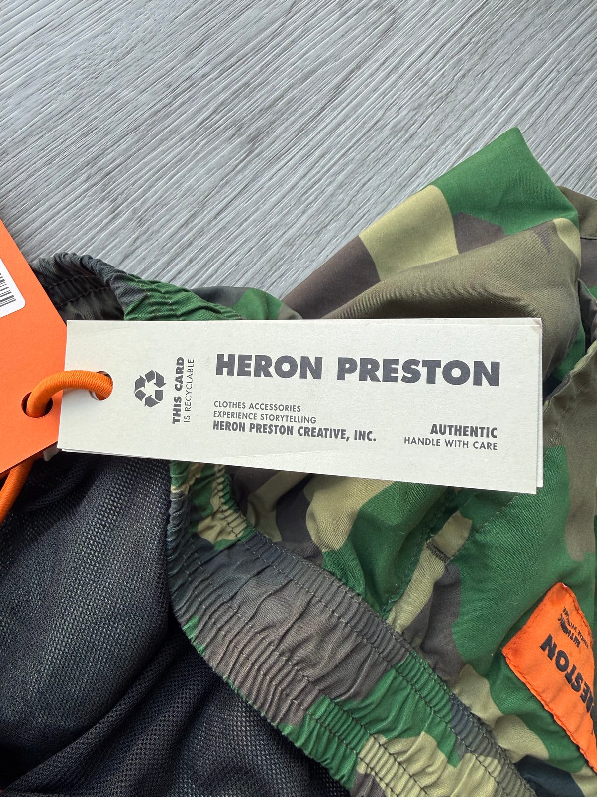 Heron Preston nylon swimshorts military green’