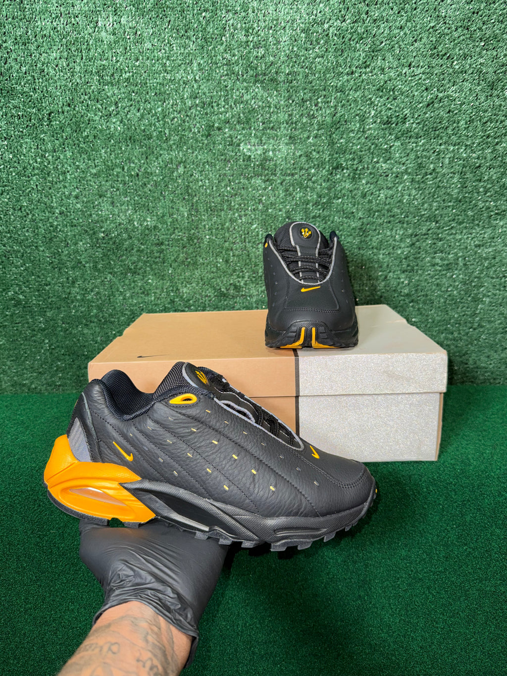 NOCTA X NIKE HOT STEP AIR TERRA ‘BLACK UNIVERSITY GOLD’