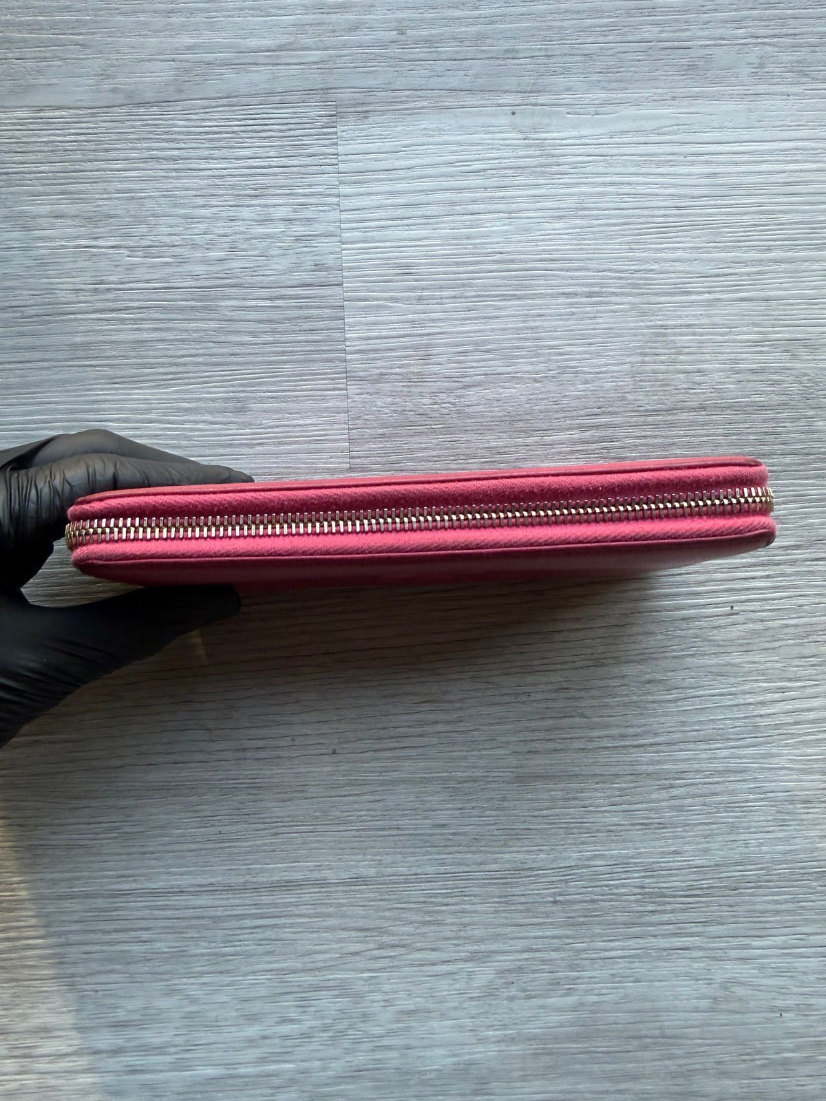YSL fuchsia leather zip-around continental long wallet with the YSL monogram logo