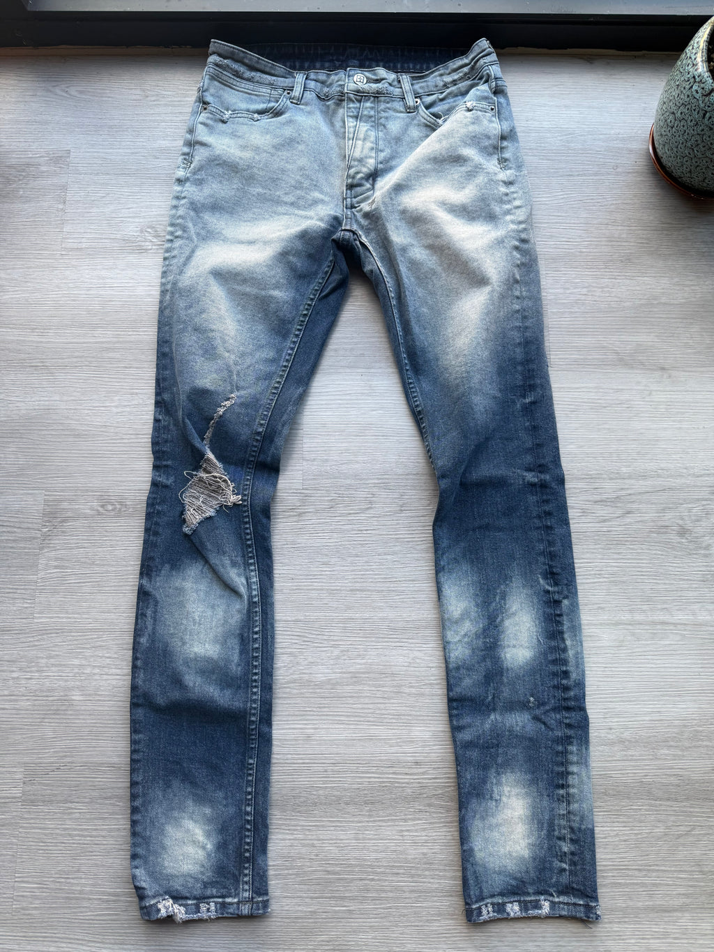 Ksubi ripped blue jeans