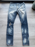 Ksubi ripped blue jeans