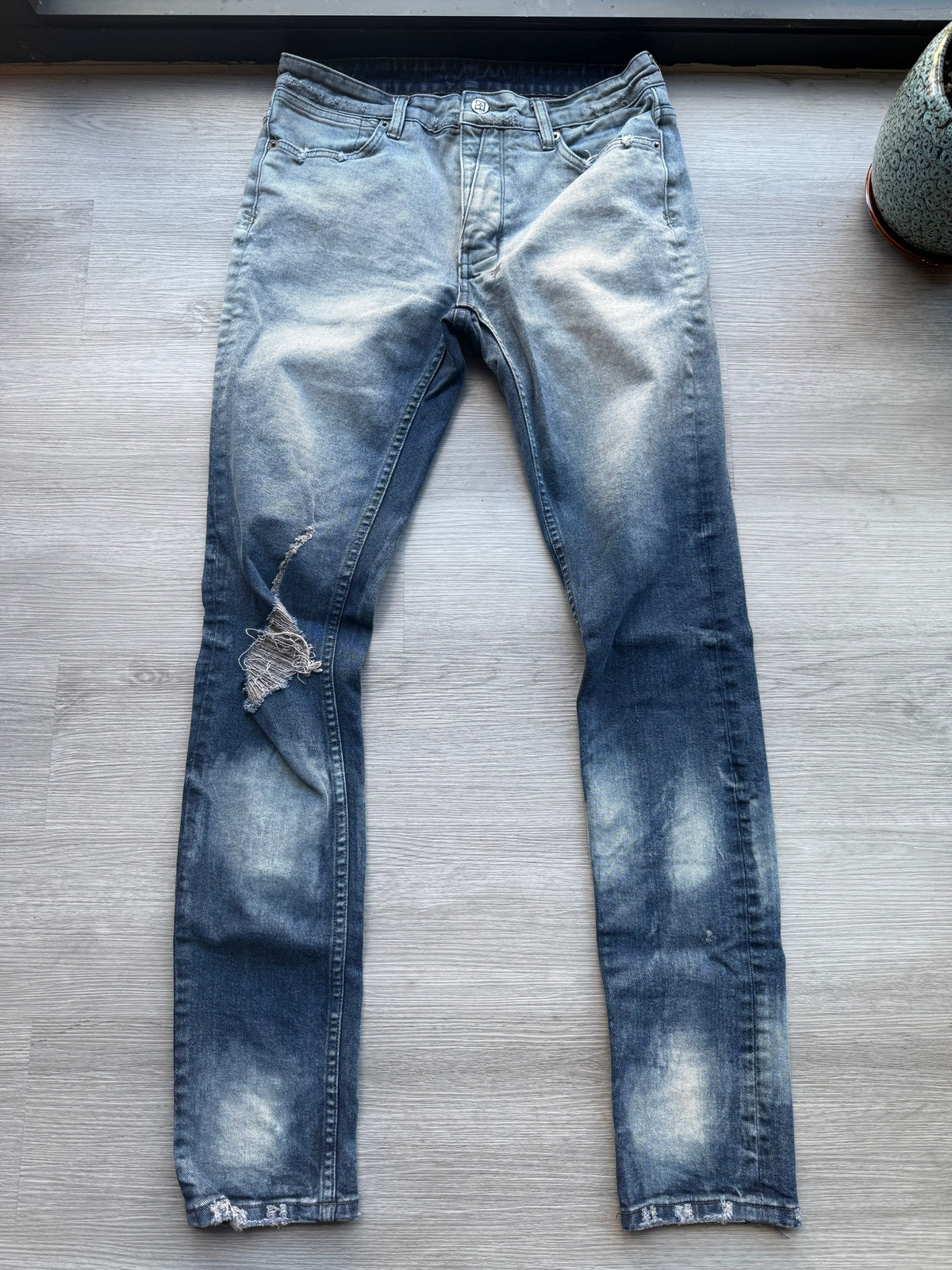 Ksubi ripped blue jeans