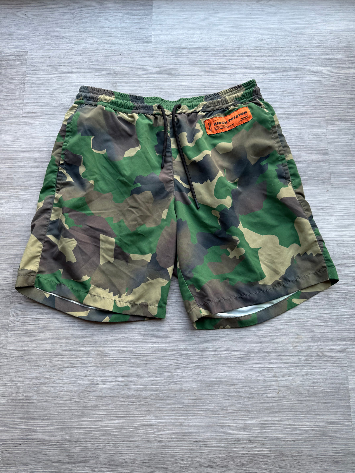 Heron Preston nylon swimshorts military green’