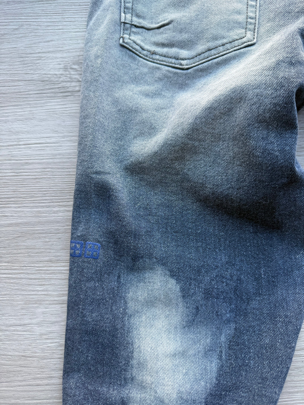 Ksubi ripped blue jeans