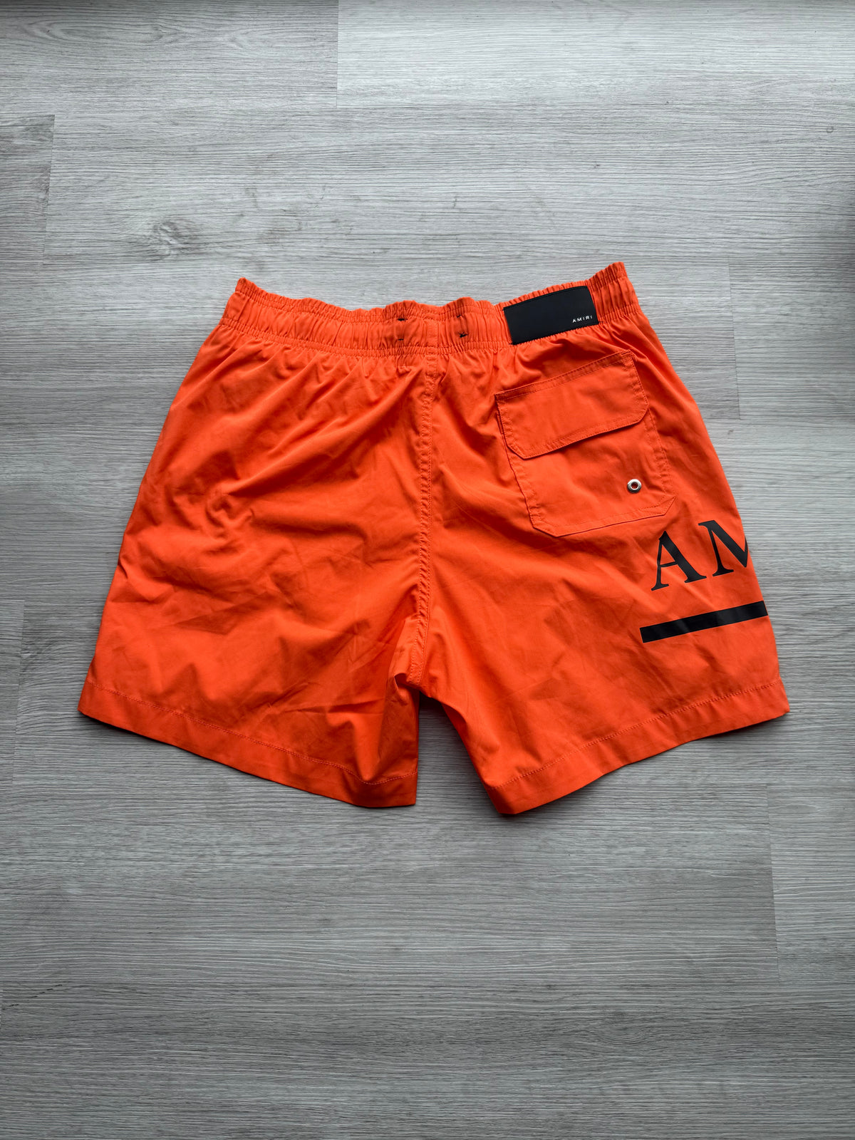 Amiri orange & black ma bar logo swimshorts