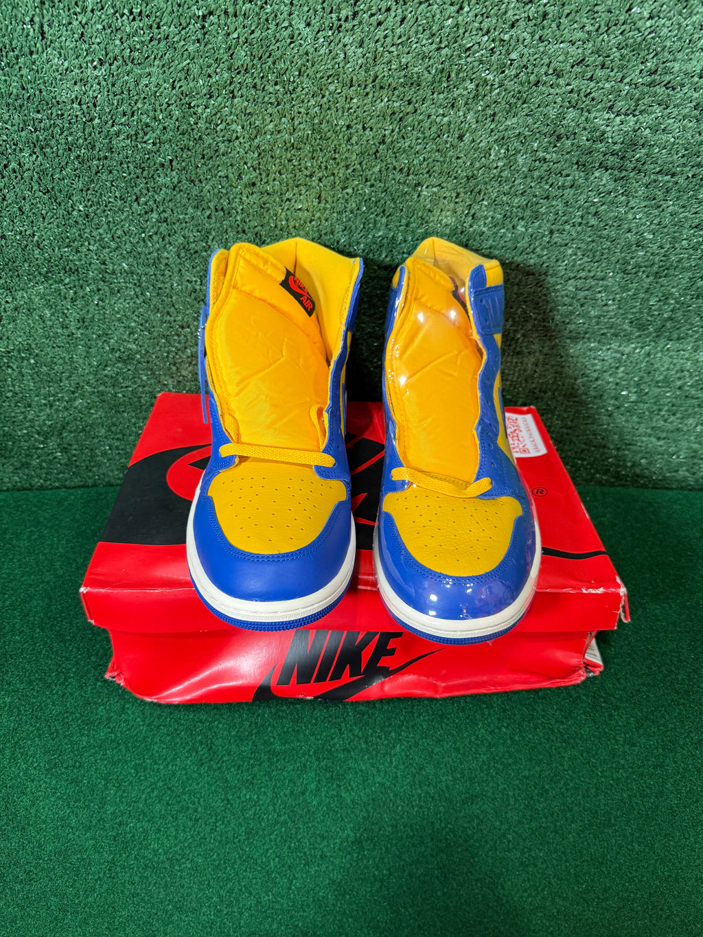 JORDAN 1 RETRO HIGH OG ‘REVERSE LANEY’ (WOMEN’S)