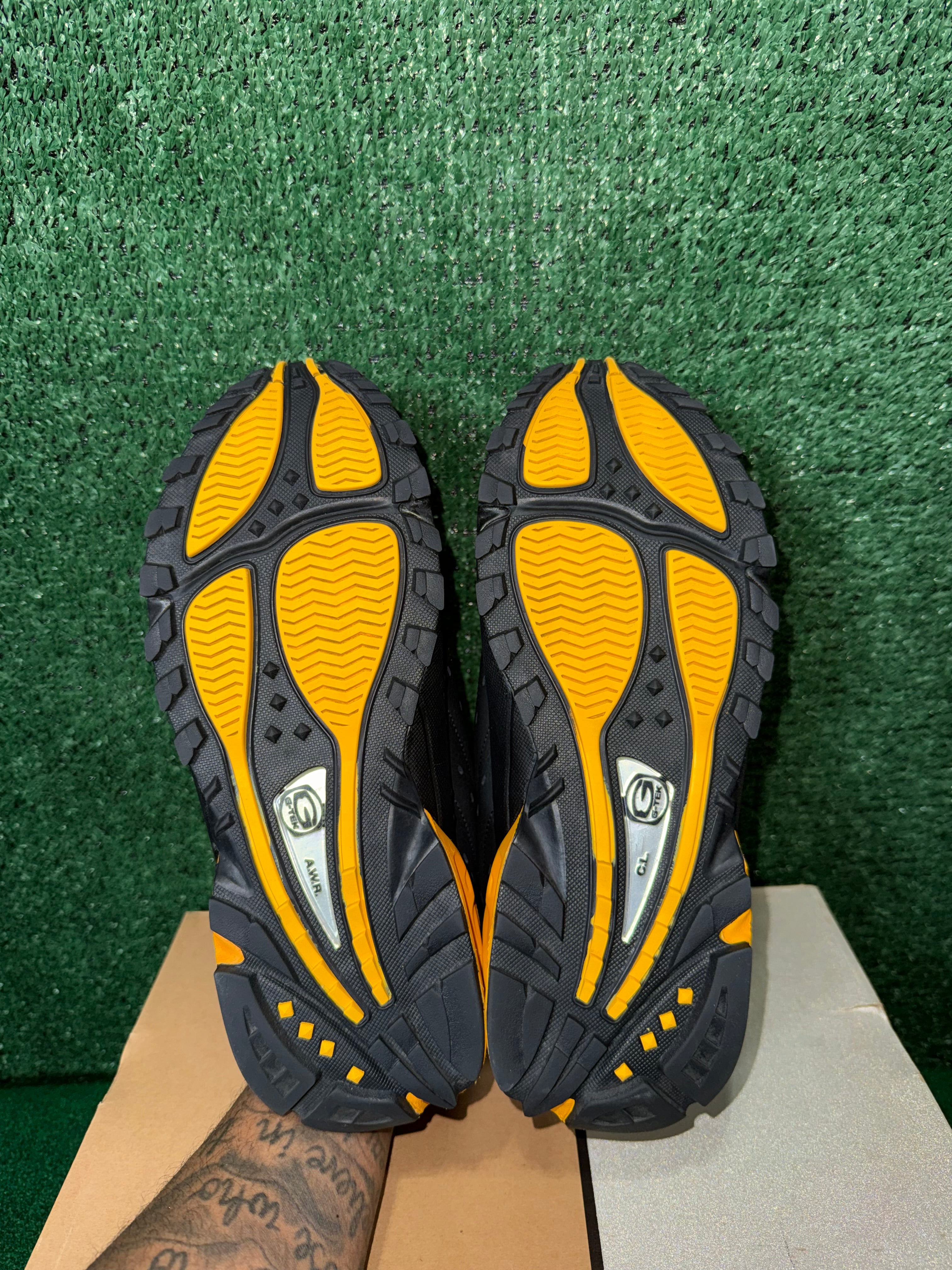 NOCTA X NIKE HOT STEP AIR TERRA ‘BLACK UNIVERSITY GOLD’